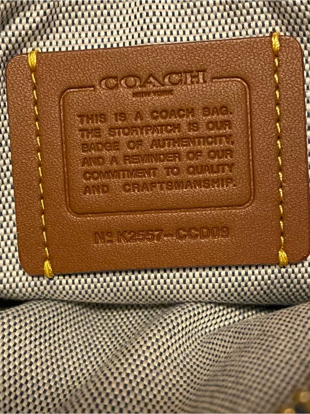 Coach Navy Pebbled Leather Mini Wristlet with Gold Hardware